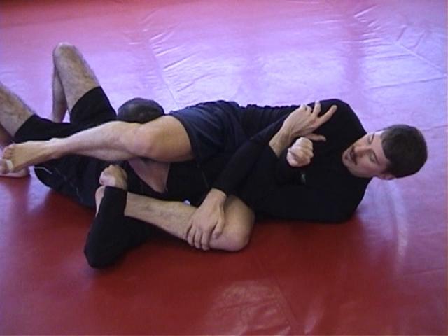 Click for a video showing a Judo for MMA technique called Kubi Hishigi from juji gatame - Neck Crush from the cross arm lock position